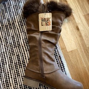 The original Muk Luks tall boot